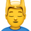 bărbat care primește un masaj facial Emoji (Apple)