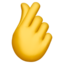 ranka sukryžiuotu smiliumi ir nykščiu Emoji (Apple)